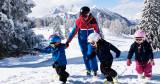 Children participating in a children's ski course at Hotel Alpina in St. Johann